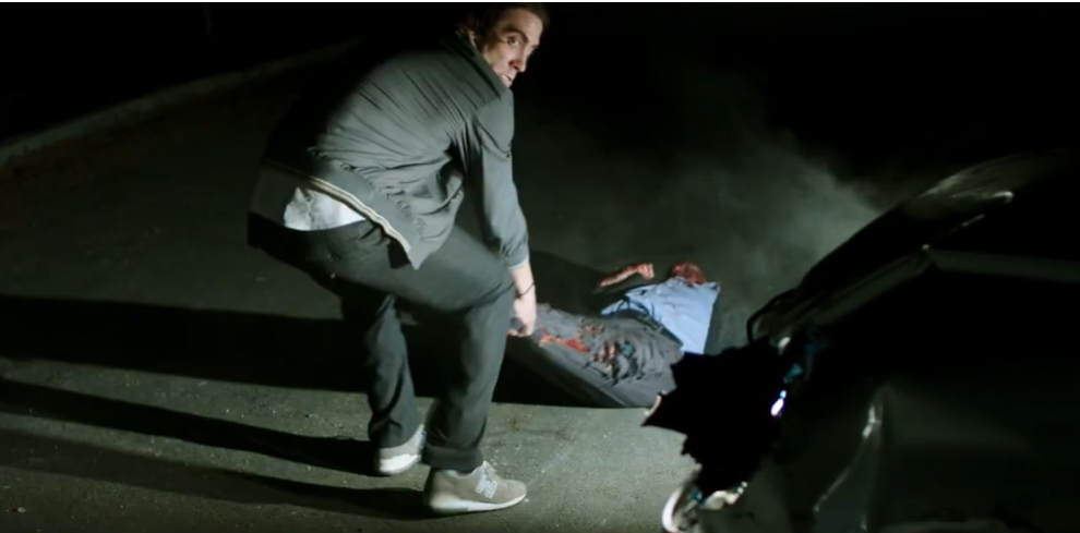 Lou drags body into the light for a clearer shot